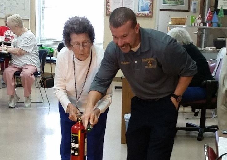Learning how to use a fire extinguisher